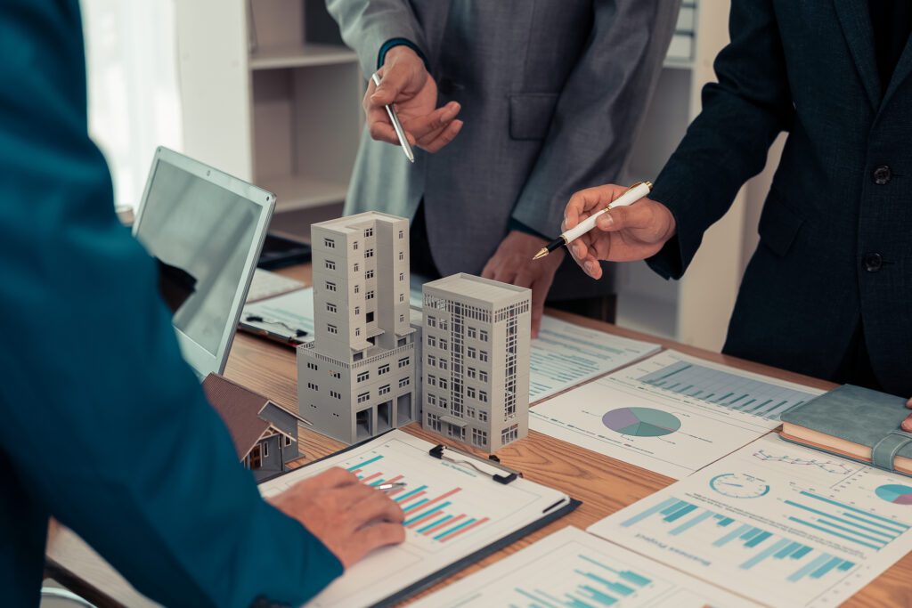 Professionals discussing real estate strategy